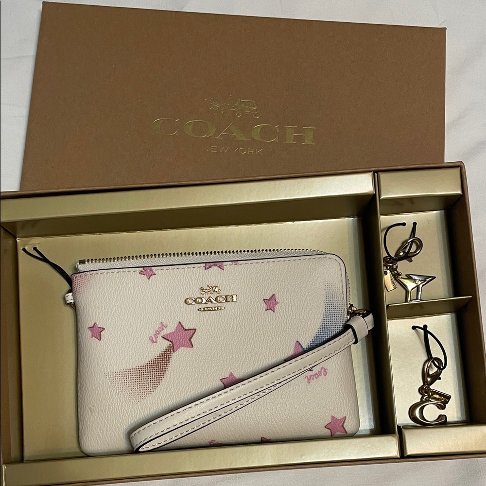 Coach Cream and Pink Star Wristlet